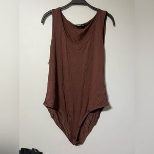 Brown body suit